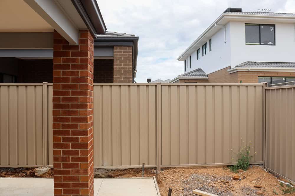 What Are My Rights When My Neighbor Owns the Wall I Want to Paint Crawley?